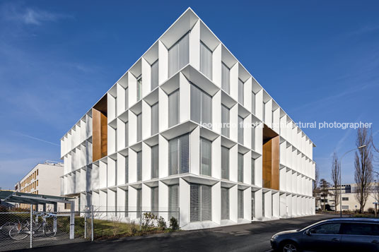 emmi-main office and apartment complex rüssli architekten