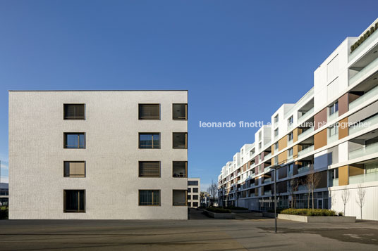 emmi-main office and apartment complex rüssli architekten