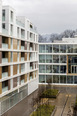 emmi-main office and apartment complex rüssli architekten